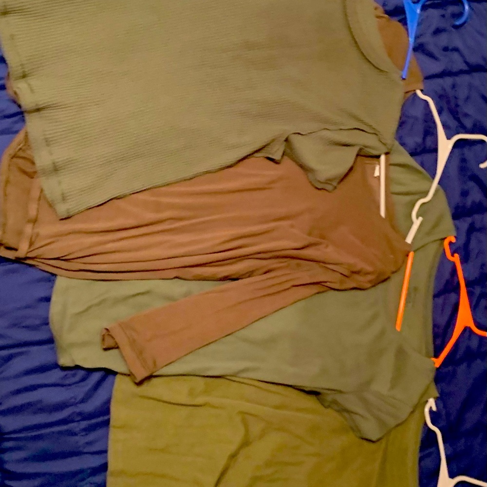 Four different color green shirts